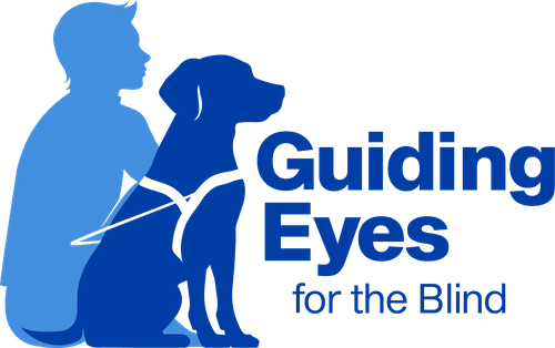 Man and guide dog sitting next to the words Guiding Eyes for the Blind
