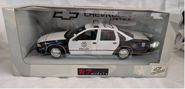 136 - UT Models Chevrolet Police Car - 1:18 Scale